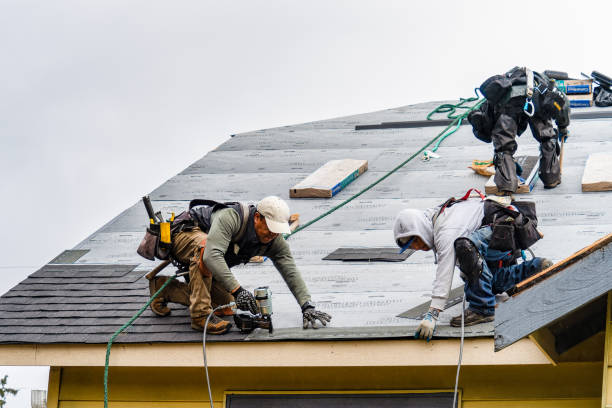 Professional Gutter Installation technician working in Sturbridge, MA